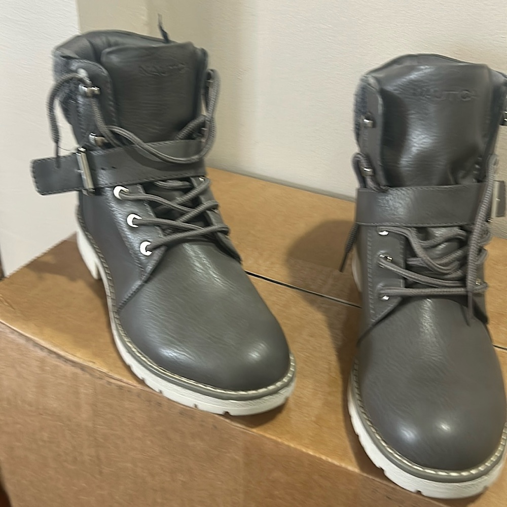 Boots. New Nautica boots buckle and lace